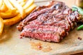 medium rare beef steak with vegetable and french fries Royalty Free Stock Photo