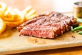 medium rare beef steak with vegetable and french fries Royalty Free Stock Photo