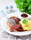 Medium rare grilled Beef steak with mashed potatoes and barbecue sauce Royalty Free Stock Photo