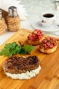Medium rare grilled Steak Ribeye on serving board block on wooden background Royalty Free Stock Photo