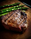 Medium Rare Grilled Tomahawk Beef Steak with Asparagus