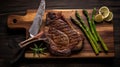 Medium rare grilled Tomahawk beef steak with asparagus
