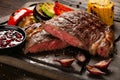 Medium Rare Ribeye steak on wooden board Royalty Free Stock Photo