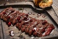 Medium Rare Skirt steak on wooden board Royalty Free Stock Photo