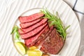Medium rare steak beef striploin on a white plate Royalty Free Stock Photo