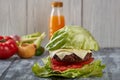 Medium roast beef hamburger with salad, without buns