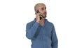 Arabic man talking on the phone on white background. Royalty Free Stock Photo