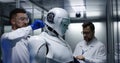 Engineers testing on robot controls