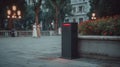 Medium shot focusing on a sensorized outdoor trash bin by a mixeduse plaza showcasing a builtin sensor alert system with Royalty Free Stock Photo