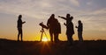 Friends stargazing together using a professional telescope