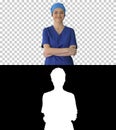 Confident nurse or doctor in blue uniform walking towards the ca Royalty Free Stock Photo