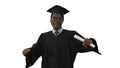 Excited african american male student in graduation robe dancing