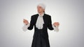 Man in old-fashioned frock coat and white wig talking and waivin