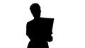 Silhouette Thinking female doctor in uniform examining a chest x Royalty Free Stock Photo