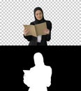 Surprised Muslim Businesswoman reading business diary and shakin Royalty Free Stock Photo