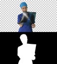 Thinking female doctor in uniform examining a chest xray, Alpha Royalty Free Stock Photo