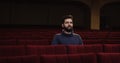 Man watching a theater performance alone Royalty Free Stock Photo