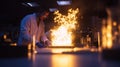 Medium shot of a scientist testing the durability of a ceramic heatresistant surface under intense flame exposure in a Royalty Free Stock Photo