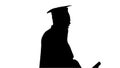 Silhouette Smiling african american male student in graduation r