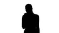 Silhouette Angry dissatisfied young woman calling customer support or mobile banking, displeased client complaining Royalty Free Stock Photo