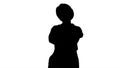 Silhouette Smiling constructor worker woman standing and changin