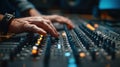 Medium shot of a sound engineer carefully adjusting equalizer settings during the highres digital mastering of analog Royalty Free Stock Photo