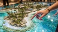 Medium shot of a user navigating a detailed digital twin of a tropical resort customizing activities and accommodation Royalty Free Stock Photo