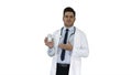Clinician Doctor Man Showing Drugs Medication and Talking to Camera on white background.