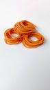 Medium size elastic rubber band in orange color for various purposes Royalty Free Stock Photo