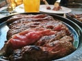 Medium soft chewy Wagyu rump steak served on hot plate