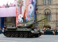 Medium tank T-34-85 with red flags on red square during a parade marking the 72nd anniversary of the Victory in the great Patrioti Royalty Free Stock Photo