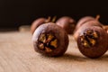 Medlar Fruits on a wooden surface. Royalty Free Stock Photo