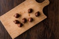 Medlar Fruits on a wooden surface. Royalty Free Stock Photo