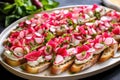 medley of radish bruschetta pieces on a big platter
