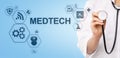 Medtech medical technology information integration internet big data concept on virtual screen. Doctor with stethoscope. Royalty Free Stock Photo