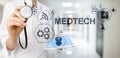 Medtech medical technology information integration internet big data concept on virtual screen. Doctor with stethoscope. Royalty Free Stock Photo