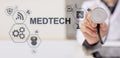 Medtech medical technology information integration internet big data concept on virtual screen. Doctor with stethoscope. Royalty Free Stock Photo