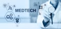 Medtech medical technology information integration internet big data concept on virtual screen. Doctor with stethoscope. Royalty Free Stock Photo