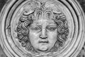 MedusaÃÂ´s head carved on marble