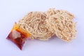 Mee siput is a famous local snack eaten with sambal