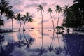 Meeru Island Maldives April 2019. - The beach at sunsrise on tropical island with palm trees. Royalty Free Stock Photo