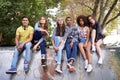 Meet the cool gang. Portrait of a group of friends hanging out together in an urban setting. Royalty Free Stock Photo