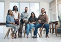 We meet our goals together. Full length portrait of a diverse group of businesspeople posing together in the office Royalty Free Stock Photo