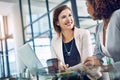 Meeting, businesswomen brainstorming or talking and together in office at work. Teamwork or collaboration, friends or Royalty Free Stock Photo