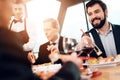 Meeting with chinese businessmen in restaurant. Men are eating sushi. Royalty Free Stock Photo