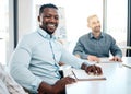 Meeting, corporate and portrait of African businessman sitting in the office boardroom with his team. Happy, smile and Royalty Free Stock Photo