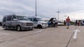 Meeting of fans of old cars at parking of shopping mall