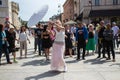 Full Gospel Church Christian Community evangelist female dancing with an umbrella in Warsaw, Poland - May 28, 2023