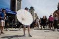 Full Gospel Church Christian Community evangelist female dancing with an umbrella in Warsaw, Poland - May 28, 2023