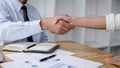 Meeting and greeting concept, Two collaboration business handshake and business people after discussing good deal of contract and Royalty Free Stock Photo